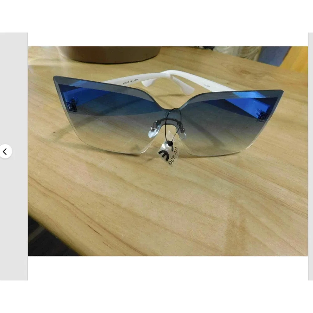 Rimless Cat Eye Sunglasses UV400 Women Light Blue Lens White New